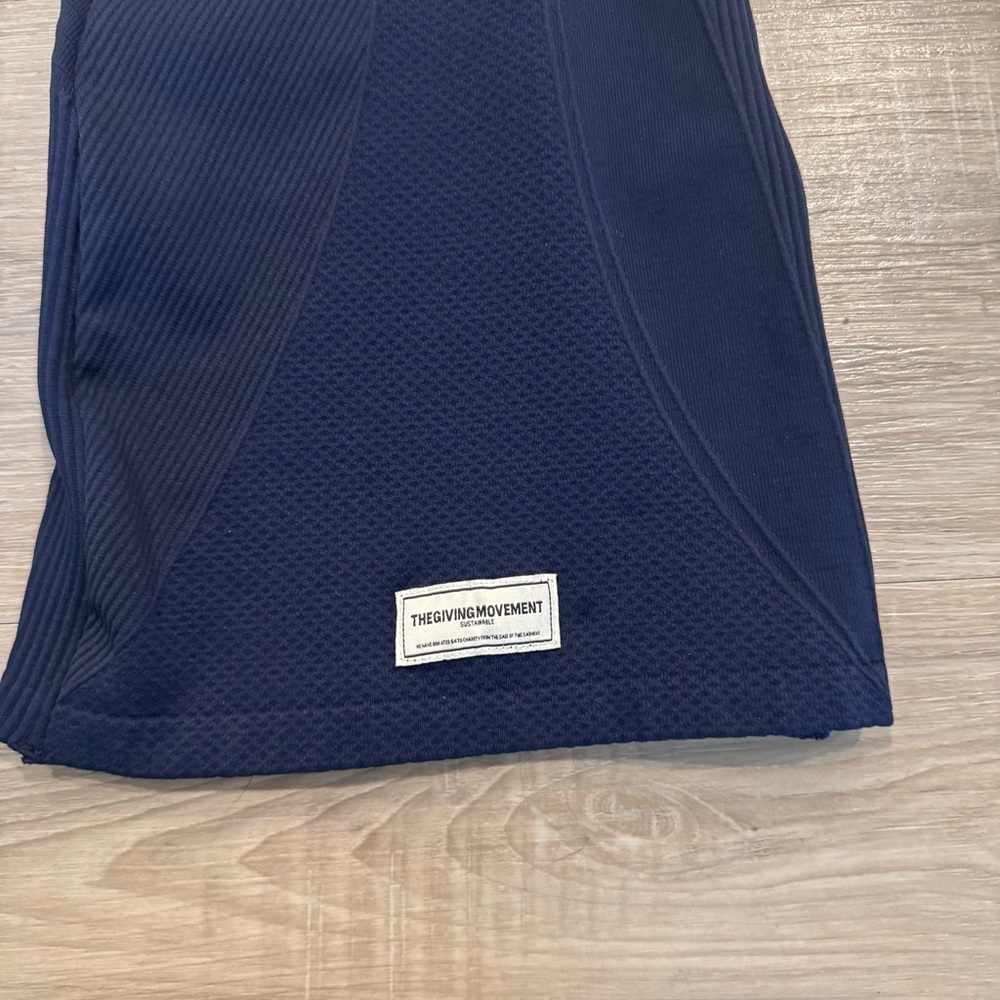 The Giving Movement Ribbed Flared Leggings in Navy - Picture 6 of 7